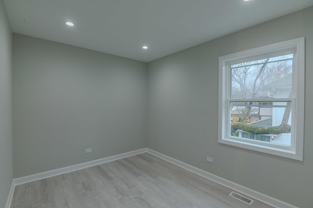 1131 S Ridgeland Ave, Oak Park, IL 60304 - unfurnished room with recessed lighting, baseboards, visible vents, and light wood-type flooring