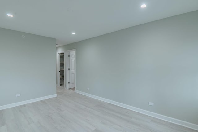 1131 S Ridgeland Ave, Oak Park, IL 60304 - unfurnished room featuring recessed lighting, light wood-type flooring, and baseboards