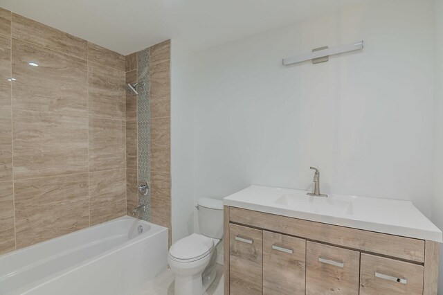 1131 S Ridgeland Ave, Oak Park, IL 60304 - full bath featuring vanity, toilet, and washtub / shower combination