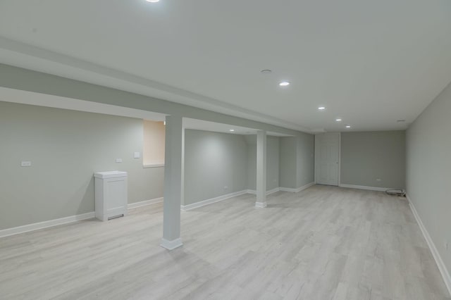 1131 S Ridgeland Ave, Oak Park, IL 60304 - finished below grade area with light wood finished floors, recessed lighting, and baseboards