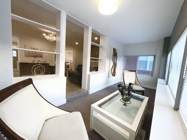 7223 S Paxton Ave, Chicago, IL 60649 - interior space with a chandelier, baseboards, and carpet