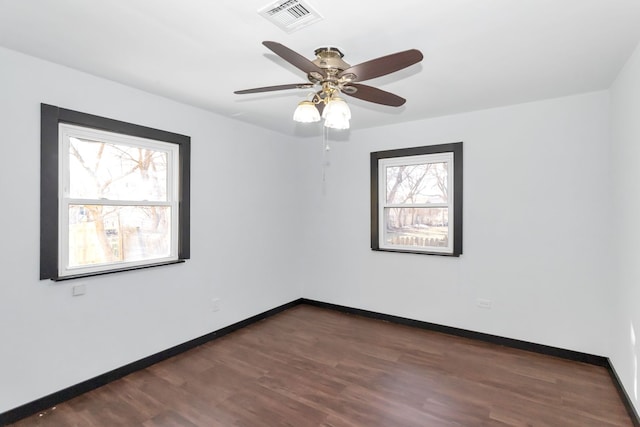 117 Arthur Ave, South Elgin, IL 60177 - spare room featuring wood finished floors, ceiling fan, and baseboards