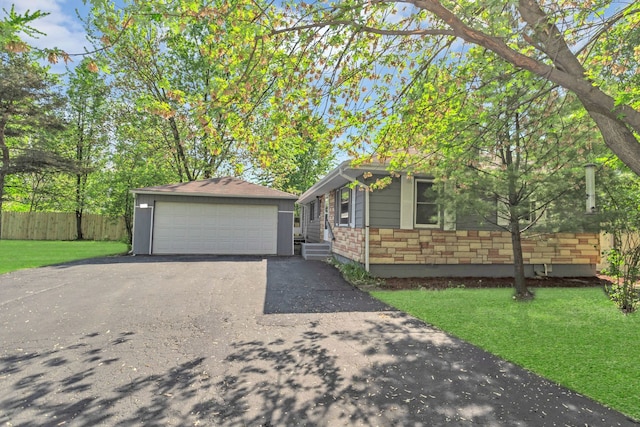 117 Arthur Ave, South Elgin, IL 60177 - view of front facade with a garage, an outbuilding, and stone siding