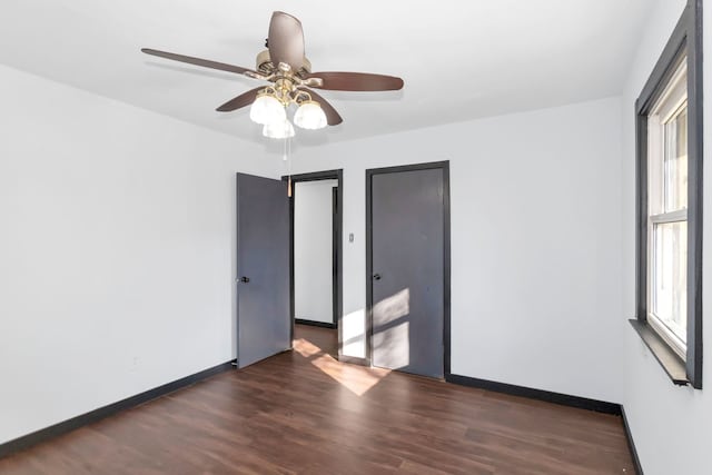 117 Arthur Ave, South Elgin, IL 60177 - empty room featuring wood finished floors, a ceiling fan, and baseboards