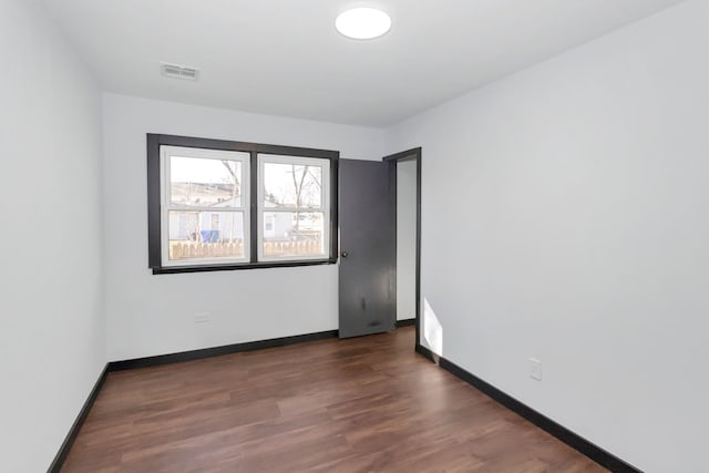 117 Arthur Ave, South Elgin, IL 60177 - empty room featuring wood finished floors and baseboards