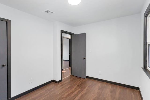 117 Arthur Ave, South Elgin, IL 60177 - unfurnished room featuring dark wood-type flooring and baseboards