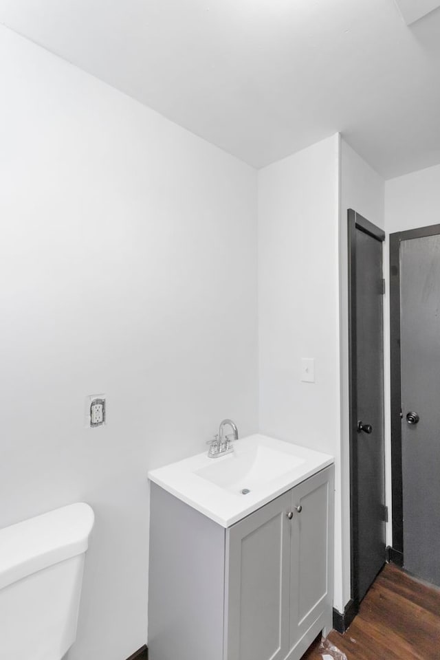117 Arthur Ave, South Elgin, IL 60177 - half bath with toilet, wood finished floors, and vanity