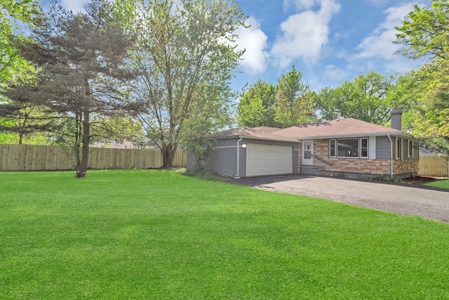 117 Arthur Ave, South Elgin, IL 60177 - view of yard with an attached garage and driveway