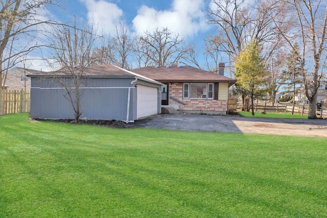 117 Arthur Ave, South Elgin, IL 60177 - rear view of house with a chimney, a garage, asphalt driveway, and roof with shingles