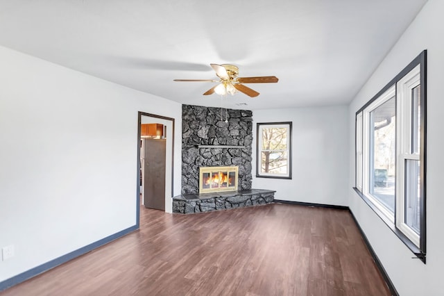 117 Arthur Ave, South Elgin, IL 60177 - unfurnished living room with wood finished floors, a ceiling fan, and baseboards