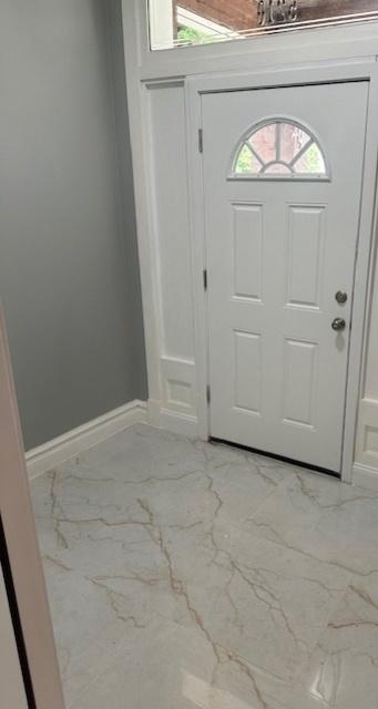 5208 S Paulina St, Chicago, IL 60609 - entryway with marble finish floor and baseboards