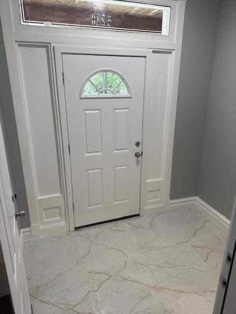 5208 S Paulina St, Chicago, IL 60609 - foyer entrance with baseboards and marble finish floor