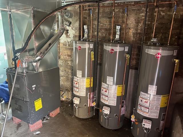 5208 S Paulina St, Chicago, IL 60609 - utility room with water heater and heating unit