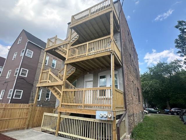 5208 S Paulina St, Chicago, IL 60609 - back of property featuring stairs and fence