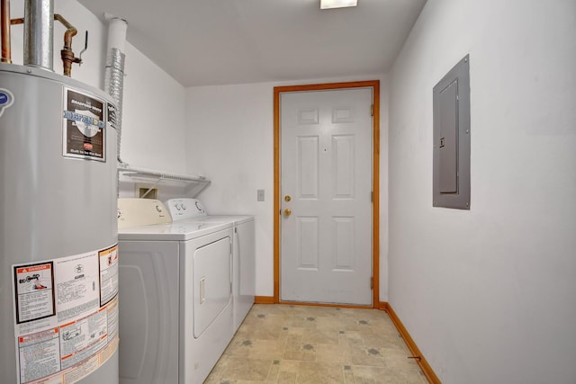 clothes washing area featuring laundry area, baseboards, washer and clothes dryer, electric panel, and water heater