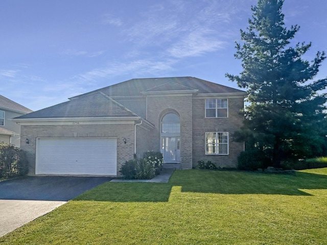 view of front of home featuring aphalt driveway, an attached garage, brick siding, and a front lawn