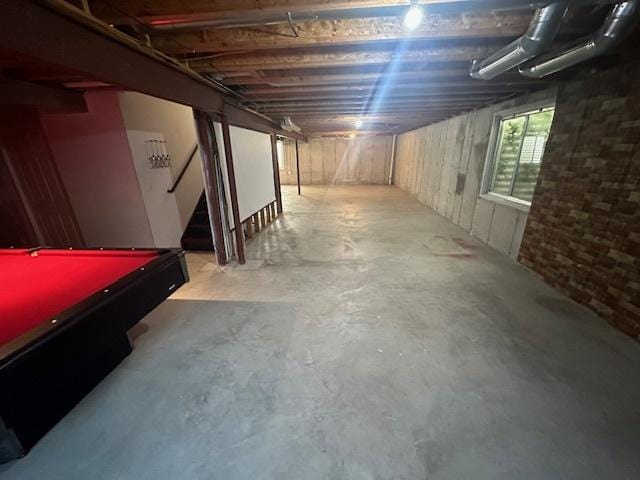 basement with stairway and pool table