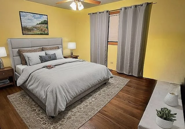 bedroom featuring a ceiling fan and wood finished floors