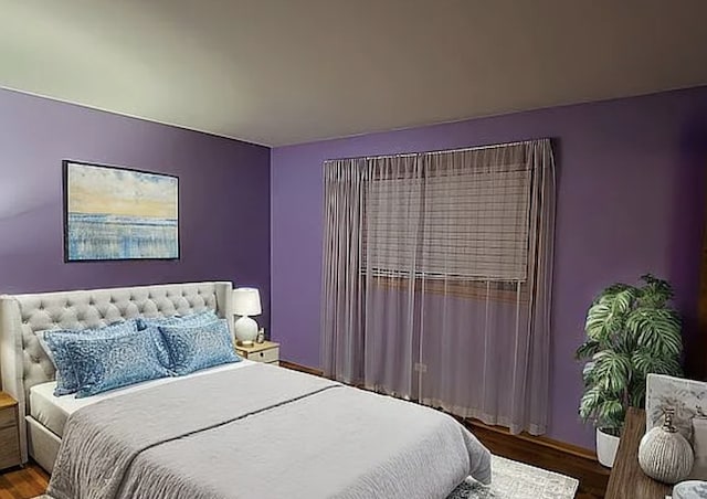 bedroom featuring wood finished floors