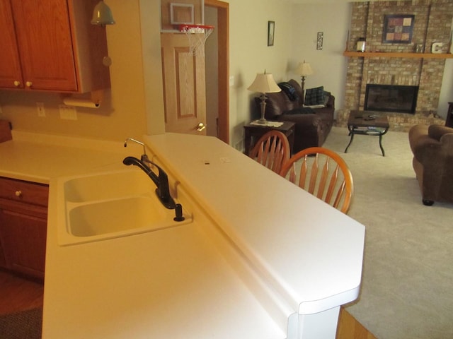 106 Tygert Ln, Dekalb, IL 60115 - carpeted dining room featuring a sink and a fireplace