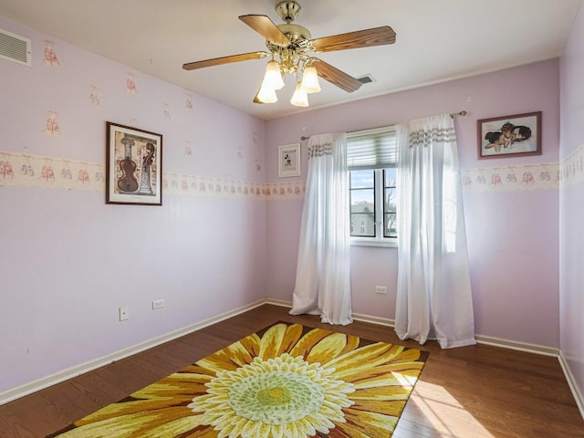 18036 Crystal Ln, Lansing, IL 60438 - bedroom with baseboards, visible vents, wood finished floors, and a ceiling fan