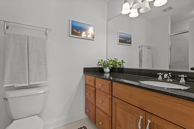 bathroom with visible vents, toilet, a shower with door, a chandelier, and vanity