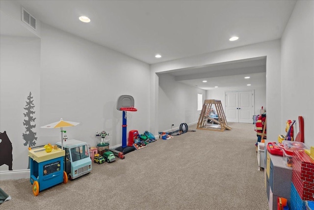 rec room featuring visible vents, recessed lighting, baseboards, and carpet floors
