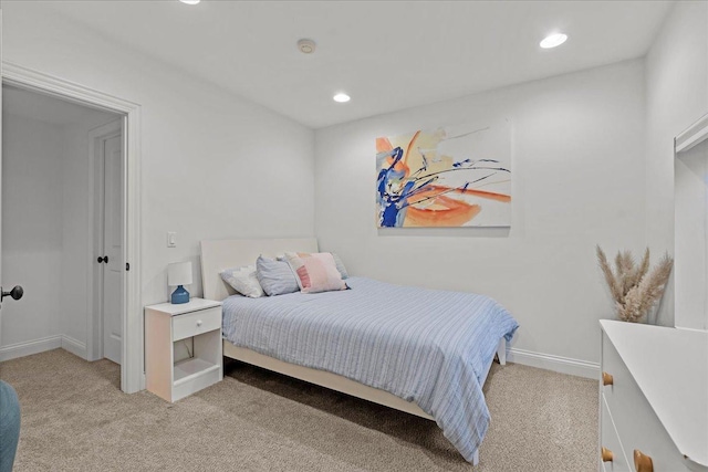 carpeted bedroom with recessed lighting and baseboards