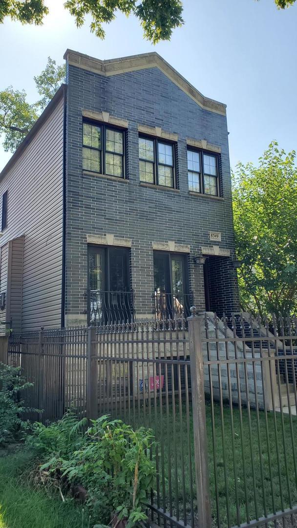 8349 S Constance Ave, Chicago, IL 60617 - view of front of home featuring a fenced front yard