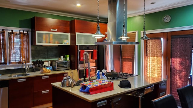 8349 S Constance Ave, Chicago, IL 60617 - kitchen with crown molding, light stone counters, appliances with stainless steel finishes, hanging light fixtures, and a sink
