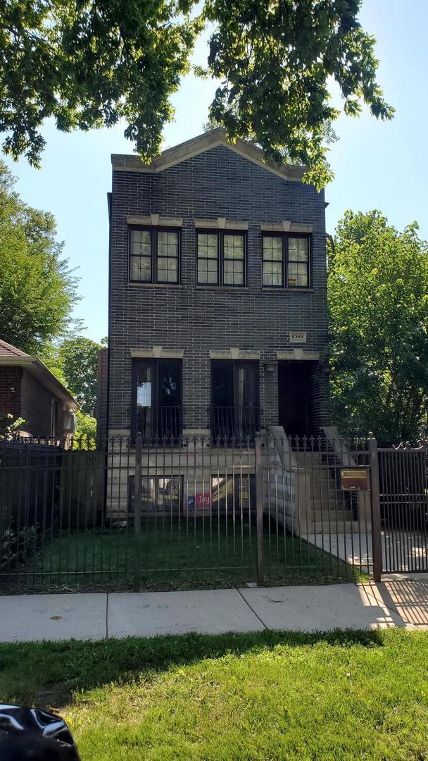 8349 S Constance Ave, Chicago, IL 60617 - view of front of home with a fenced front yard