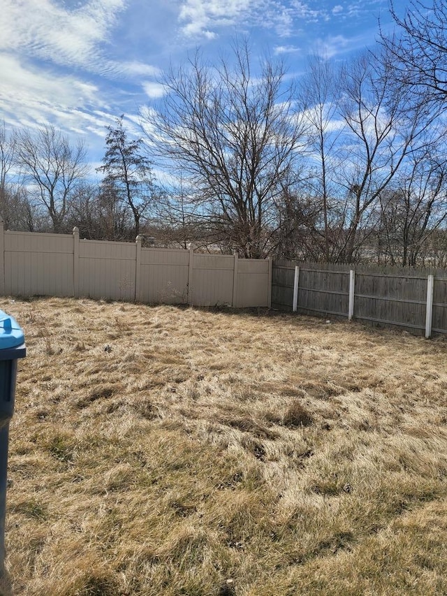 view of yard with fence