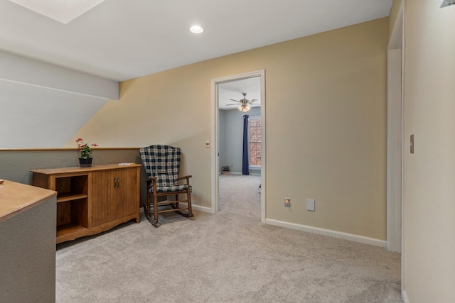 sitting room featuring ceiling fan, light colored carpet, vaulted ceiling, recessed lighting, and baseboards
