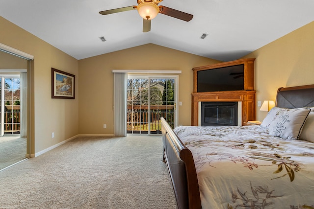 bedroom featuring vaulted ceiling, a ceiling fan, visible vents, access to exterior, and carpet