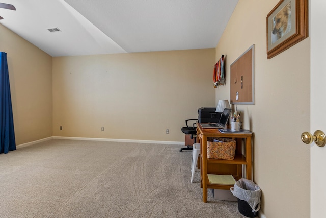 interior space with ceiling fan, baseboards, and visible vents