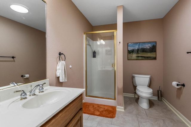 bathroom with vanity, baseboards, tile patterned flooring, toilet, and a shower stall