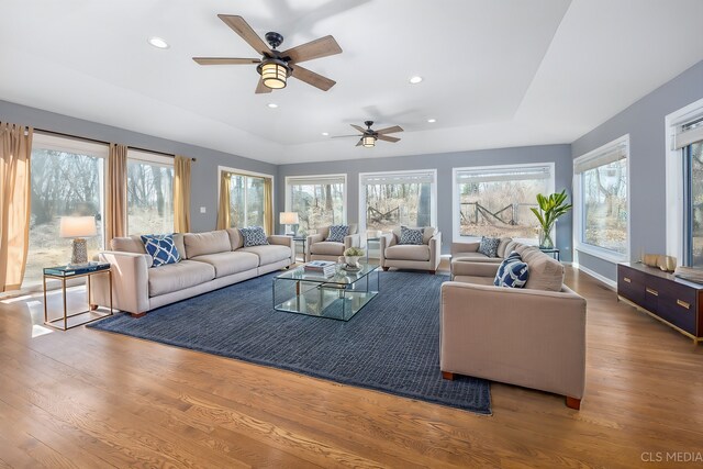 4 Auburn Ln, Barrington Hills, IL 60010 - living room with wood finished floors, a ceiling fan, plenty of natural light, recessed lighting, and a raised ceiling