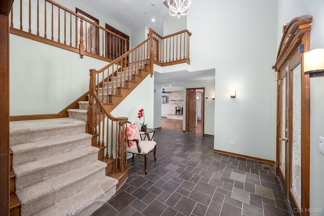 4 Auburn Ln, Barrington Hills, IL 60010 - stairway featuring a high ceiling and recessed lighting
