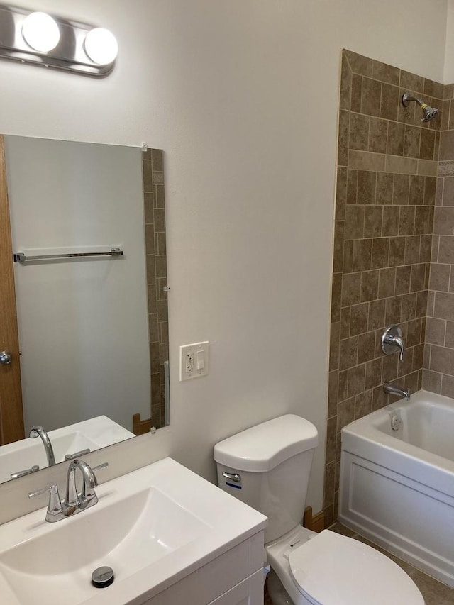 bathroom with vanity, bathing tub / shower combination, and toilet