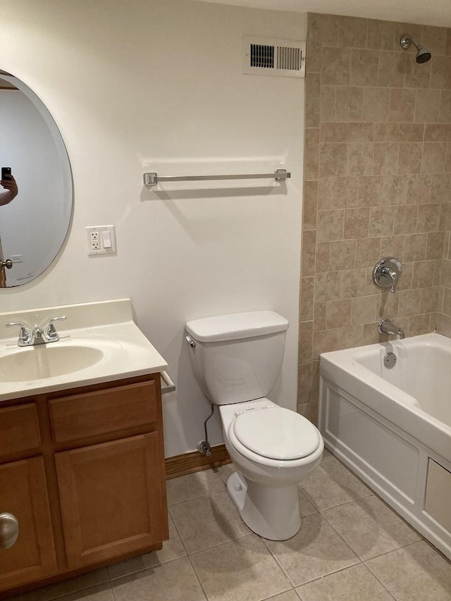 full bathroom with tile patterned flooring, toilet, vanity, and visible vents