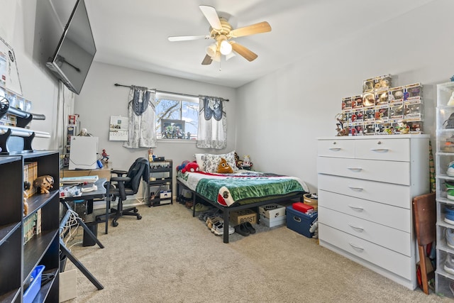 carpeted bedroom with a ceiling fan