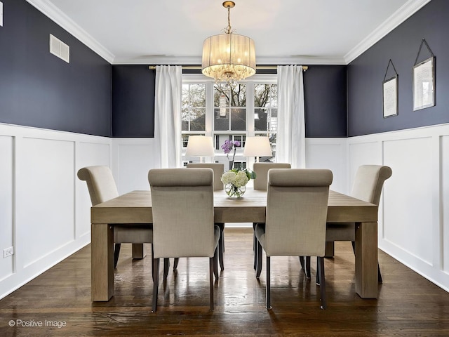 513 W Chicago Ave, Hinsdale, IL 60521 - dining room with a decorative wall, a chandelier, crown molding, wainscoting, and dark wood-style flooring