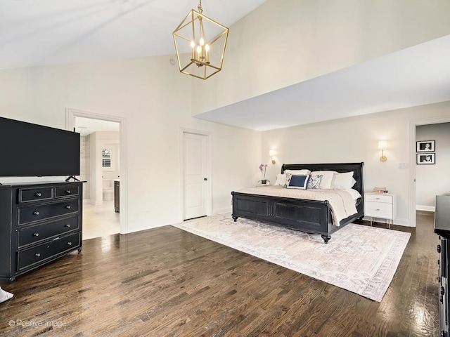 513 W Chicago Ave, Hinsdale, IL 60521 - bedroom featuring high vaulted ceiling, dark wood finished floors, a chandelier, and connected bathroom