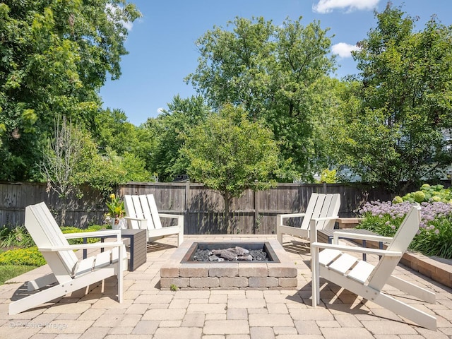 513 W Chicago Ave, Hinsdale, IL 60521 - fenced backyard featuring a fire pit and a patio area