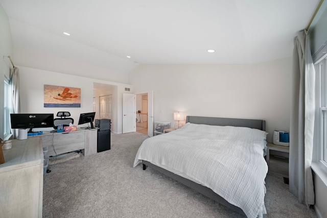 carpeted bedroom with recessed lighting and vaulted ceiling
