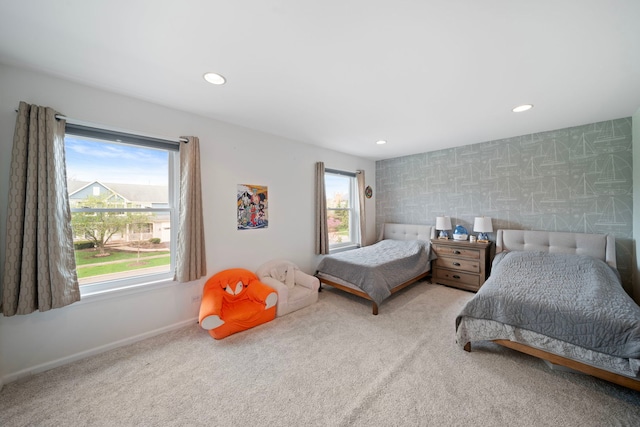 bedroom featuring recessed lighting, carpet, and baseboards