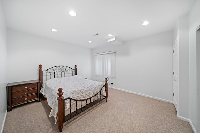 carpeted bedroom with recessed lighting, visible vents, and baseboards
