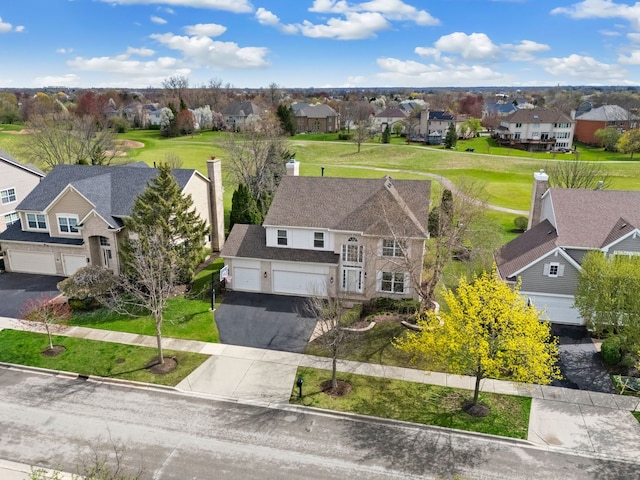 birds eye view of property with a residential view