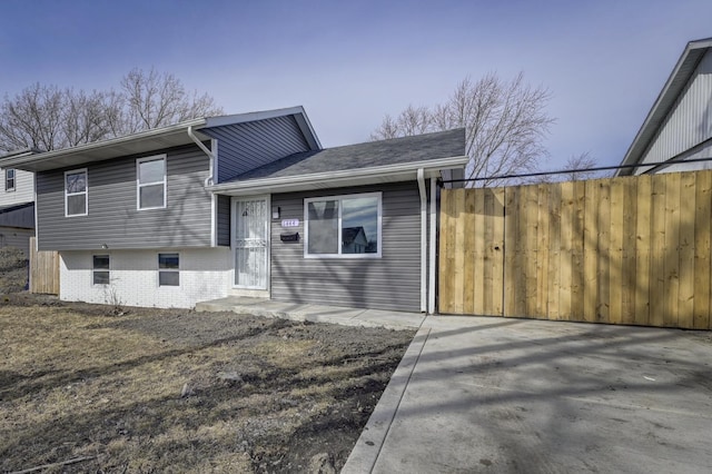 view of front of house with fence