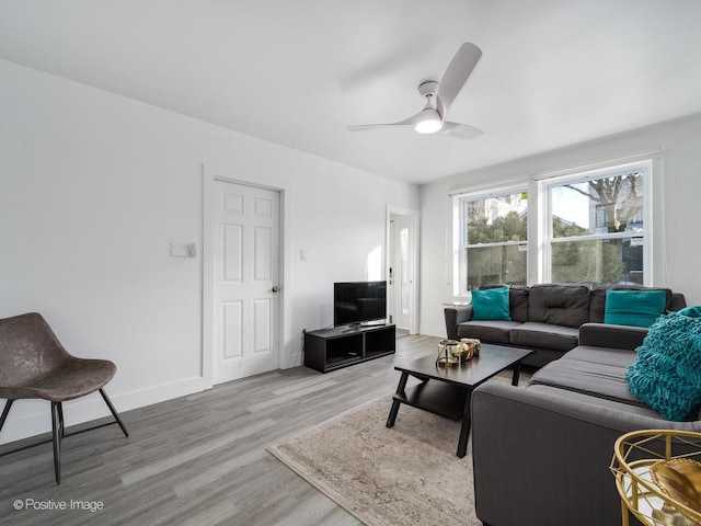 1812 W Erie St, Chicago, IL 60622 - living room featuring light wood-style flooring, a ceiling fan, and baseboards